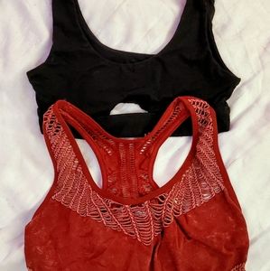 2 sports bras, size small, black with a cut-out area, and a copper xhilaration